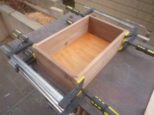Here's the new router bit box in glue up; those clinch joints work just as well for drawers as they do for boxes.